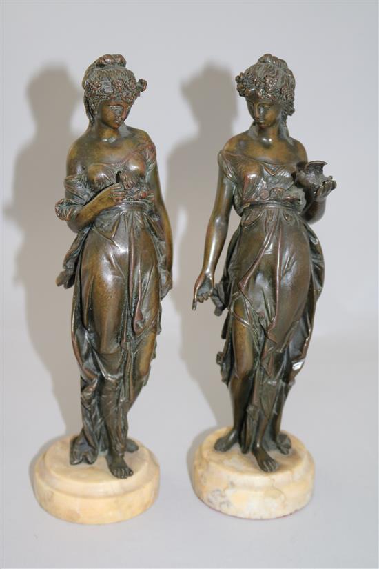 A pair of late 19th century French bronze figures of classical maidens, 11in.